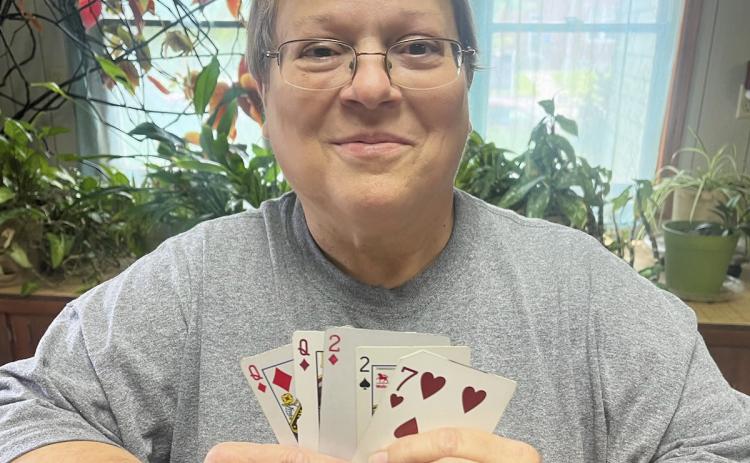 Earl wins $100 in Shop Local Poker Run